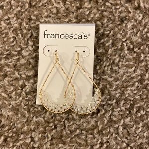 Gold and white earrings from Francesca’s
